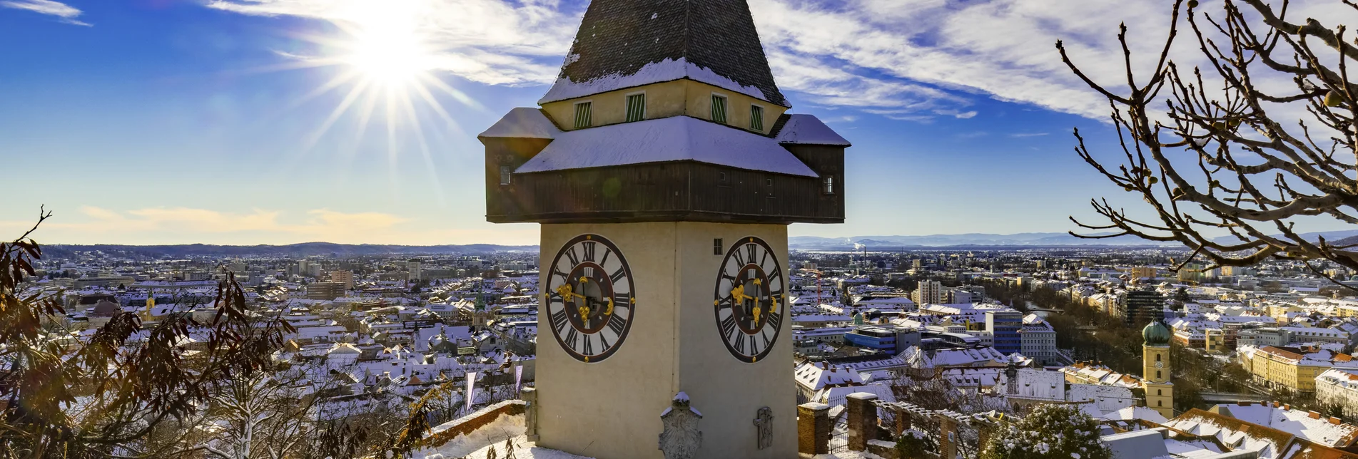 Clock tower on the Schlossberg in winter | © Steiermark Tourismus | Harry Schiffer